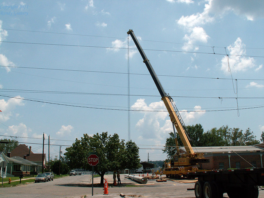 picking up one end of the pole