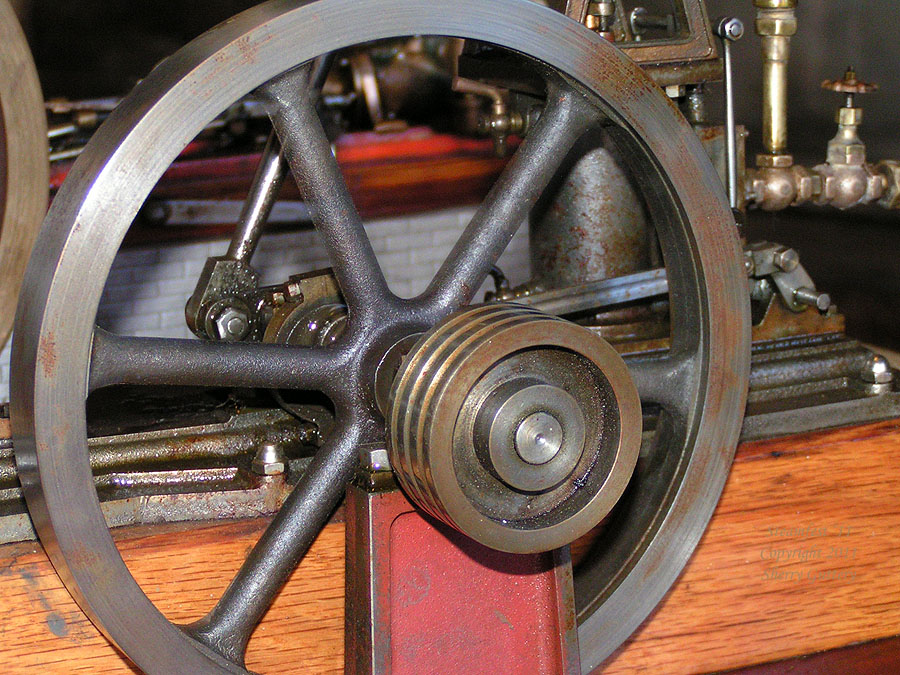 Flywheel on one of the smaller engines Skid mounted engines in the Steam Demonstratin Room - Soule' Steamfest 2011