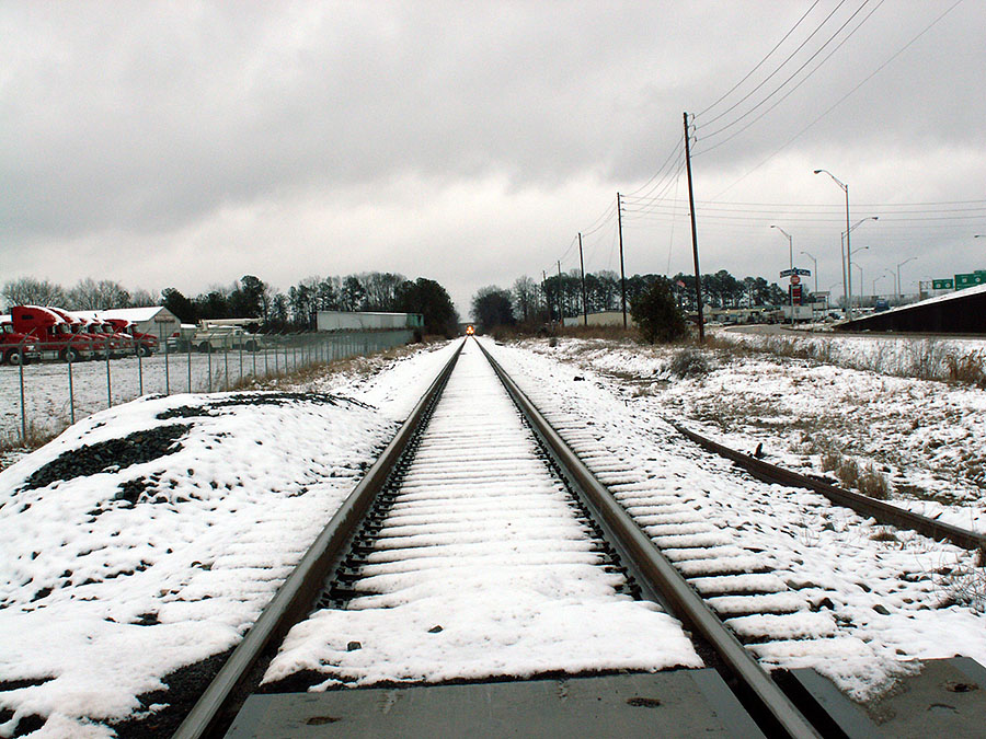 Snow on Meridian Speedway - Meridian, MS High speed freight rail
